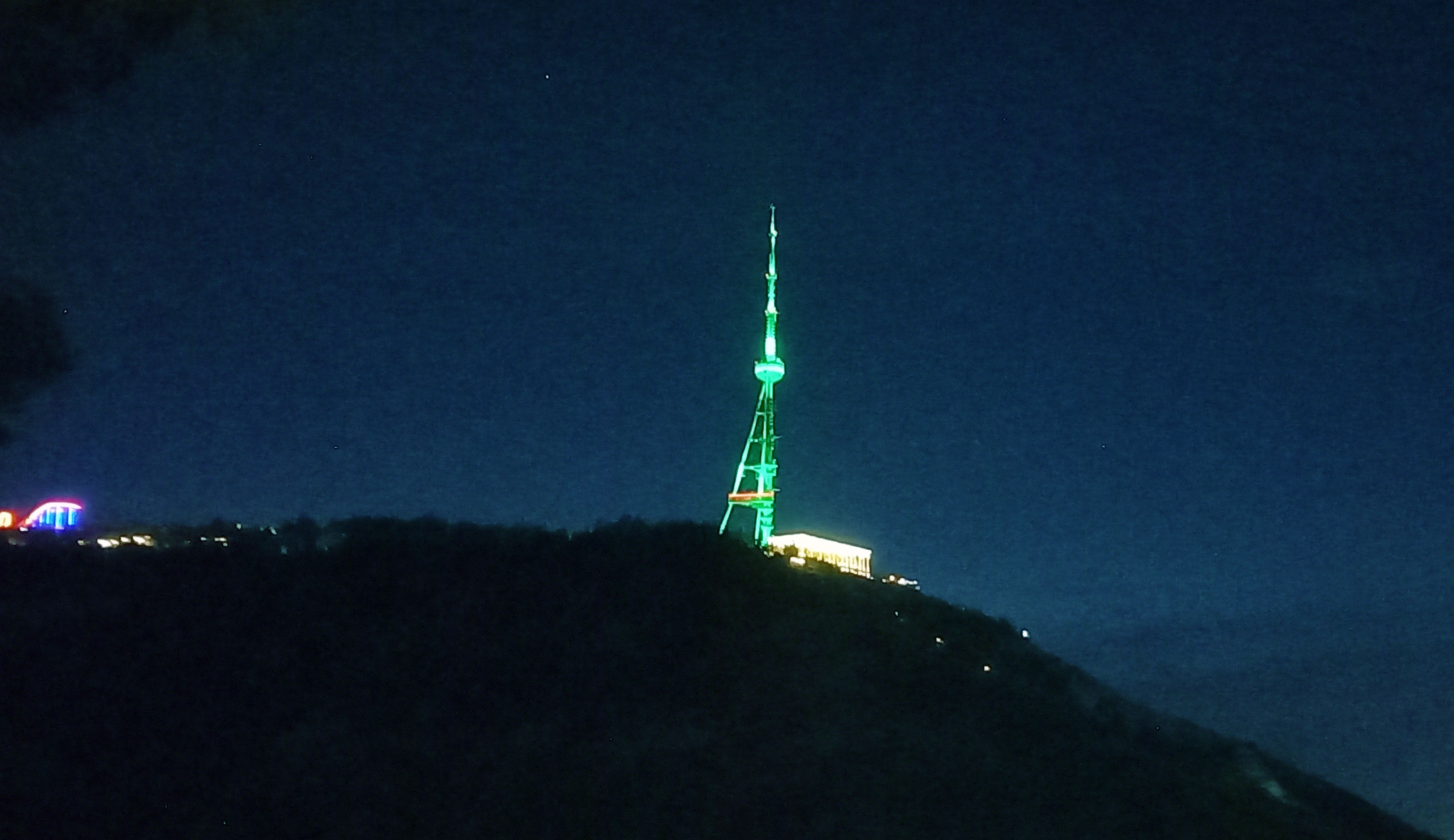 tbilisi-tv-tower-illuminated-turkmenistan-flag-colors-constitution-day (3).jpg